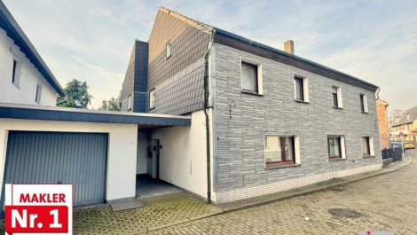Charaktervolles Zweifamilienhaus mit Garten, Garage und Stellplätzen sucht Handwerker in OB-Holten