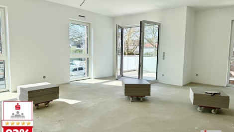 schlüsselfertiger Neubau: barrierearme Etagenwohnung mit Sonnenbalkon und Tiefgaragenstellplatz