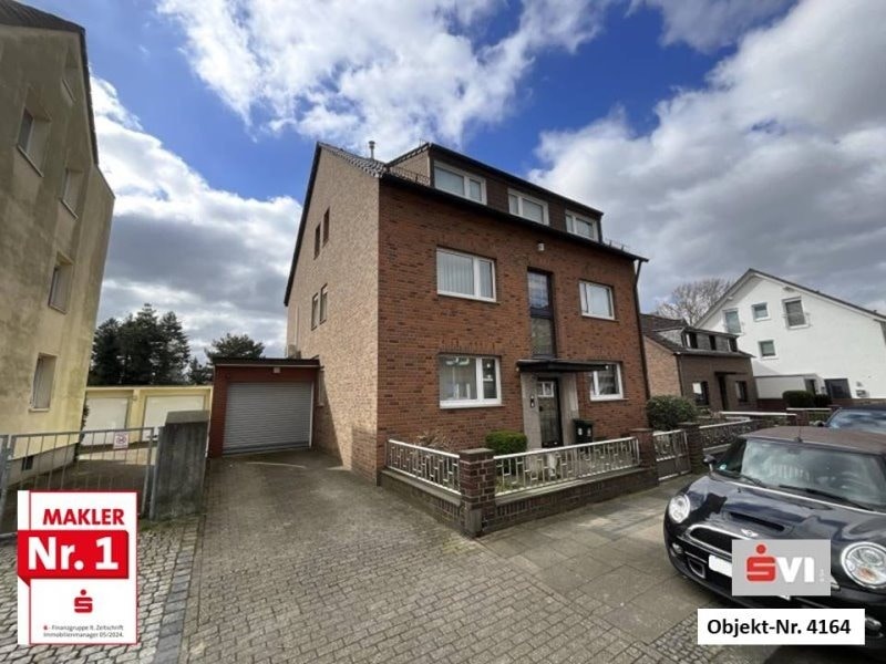 Großzügiges Mehrfamilienhaus mit Gewerbe in Oberhausen-Dümpten Großzügiges Mehrfamilienhaus mit Gewerbe in Oberhausen-Dümpten