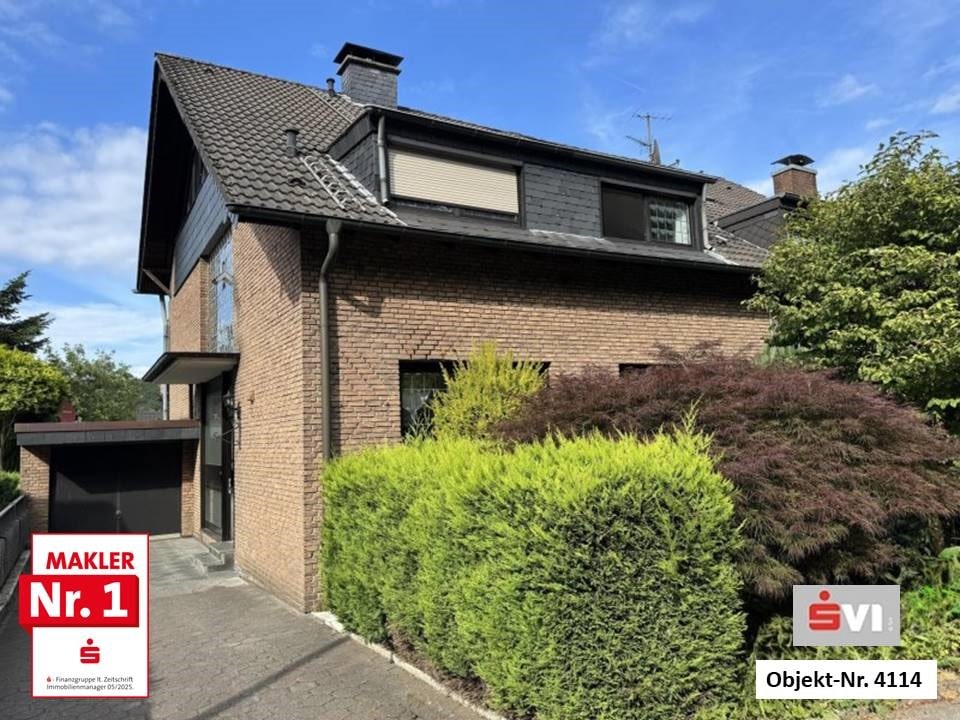 Teilvermietetes Zweifamilienhaus mit Doppelgarage und Garten in bevorzugter Lage von Königshardt Teilvermietetes Zweifamilienhaus mit Doppelgarage und Garten in bevorzugter Lage von Königshardt