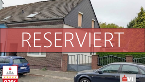 Sanierungsbedürftige Doppelhaushälfte mit zwei Garagen und großem Garten in Oberhausen-Schlad