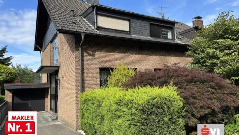 Teilvermietetes Zweifamilienhaus mit Doppelgarage und Garten in bevorzugter Lage von Königshardt