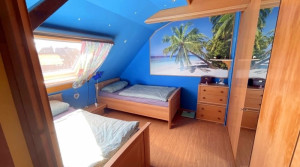 Wohnlich getaltete Nutzfläche DG