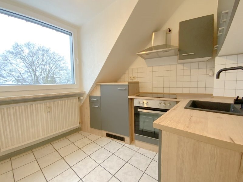 Gut aufgeteilte 2,5-Zimmer-Dachgeschosswohnung im gepflegten 3-Parteienhaus in Oberhausen-Styrum - Foto 5
